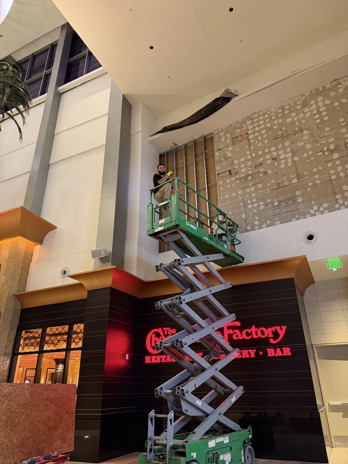 Restaurant demolition with scissor lift by Superior Demo in Broward County FL
